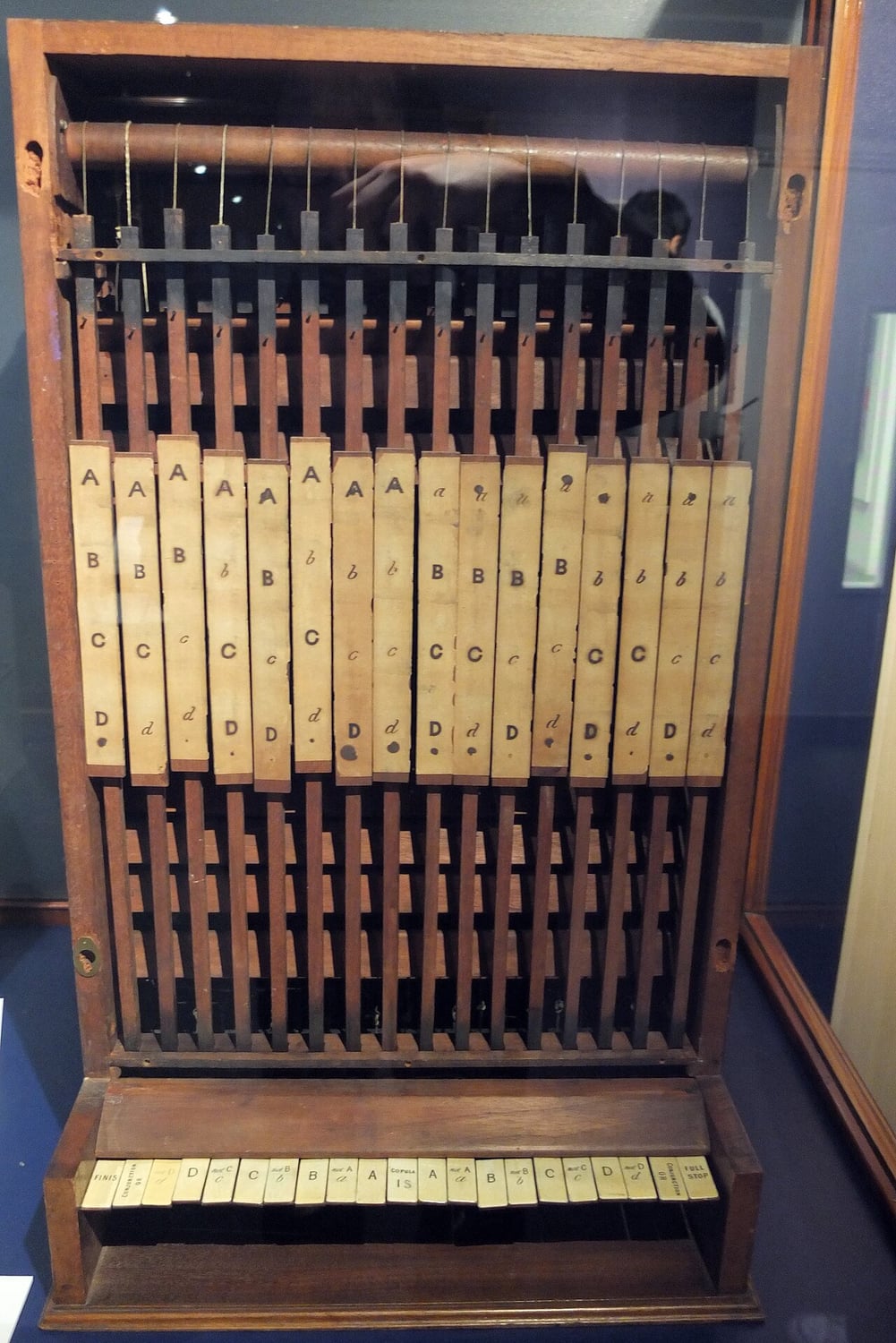 William Stanley Jevons's logical piano, a wooden cabinet with a row of keys and a display of logic terms above