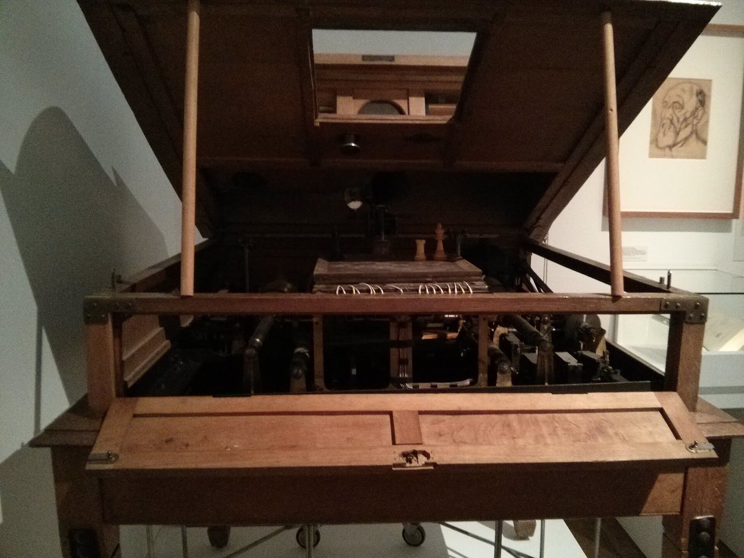 Leonardo Torres Quevedo's El Ajedrecista chess automaton, a wooden mechanism over a small chessboard